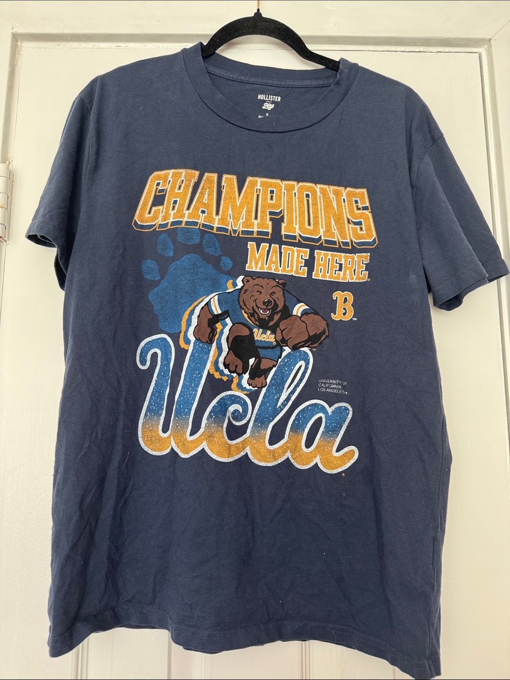 Hollister Navy UCLA Champions Graphic Tee with Gold Accents